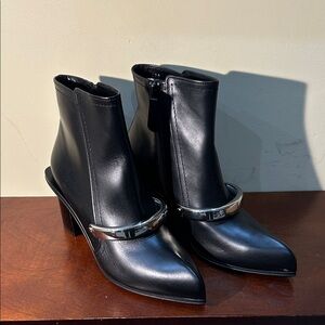 black leather Alexander McQueen Metal Bar ankle boots
